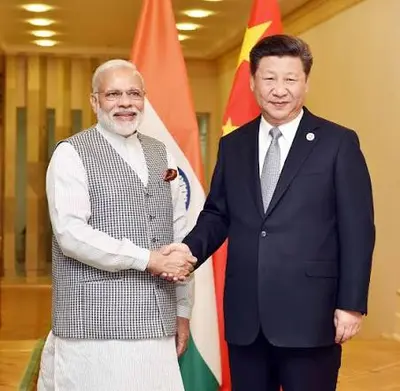 Xi Comes to India with a Diplomatic Hand shake, Business Still Keeps Its Distance