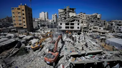 Gaza War Scarred Building Give Way, 21 Dead Eight Children Among Victims